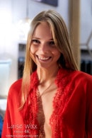 Luise Wixx In Scarlet Sheer And Seductive Stillness Video Luise Wixx In Scarlet Sheer And Seductive Stillness Video