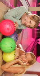 Young lesbians fuck each other in the bowling alley