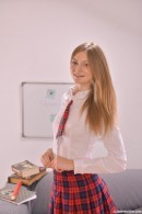 Merry Pie wearing a naughty schoolgirl uniform