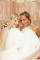 Two delicious blondes having dildo fun in the bath