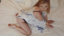 Harlow Crane Plays On The Bed