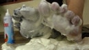 Super-hot Bianca Rubbing White Cream All Over Her Sexy Feet video from FOOTFETISHBEAUTIES