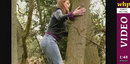 Autumn wets her jeans while trying to climb up a tree