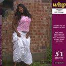 Naughty Ebony Wets Herself Under Her Long White Skirt