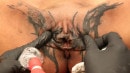 Tattooing A Butterfly On Raving Beauty Sindy Ink's Pussy