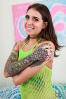 Pearl Sage Stands Out In Neon Green