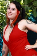 Gigi Is All Dolled-up In Her Red Dress