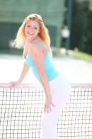 Busty Redhead On The Tennis Court
