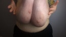 Titania Throws Around Her Massive Long Tits
