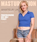 British MILF Scarlett St. Claire Fingers Her Shaved MILF Pussy video from MATURE.NL
