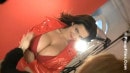 Denise Milani - Red Slicker - Part 1 video from PINUPFILES