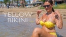 Yellow Bikini On The Beach