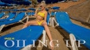 Paige M in Oiling Up gallery from REALBIKINIGIRLS