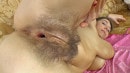Agneta Rubs Oil Over Body And Masturbates