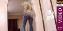 Jennifer pees her blue jeans